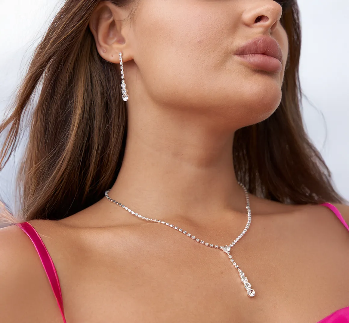Diamond drop earrings and a matching necklace